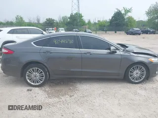 2016 Ford Fusion SE with VIN 3FA6P0T99GR276791, listed as a IAAI auction lot 42445910 with 117,355 mi miles and . Bid and sale history available at DreamBid. Image 13.