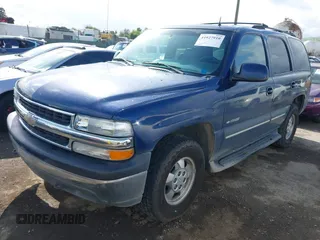 2002 Chevrolet Tahoe LS with VIN 1GNEK13T32J252373, listed as a IAAI auction lot 41927910 with 167,438 mi miles and . Bid and sale history available at DreamBid. Image 2.