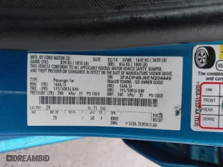2014 Ford Fiesta SE with VIN 3FADP4BJ6EM204449, listed as a IAAI auction lot 41992813 with 92,026 mi miles. Bid and sale history available at carsss.com. Image 9.