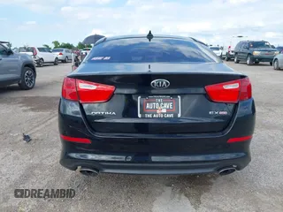2015 Kia Optima EX with VIN 5XXGN4A75FG357829, listed as a IAAI auction lot 42302163 with 115,277 mi miles and . Bid and sale history available at DreamBid. Image 16.