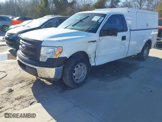 2014 Ford F-150 XL with VIN 1FTMF1CM0EKG22856, listed as a IAAI auction lot 41677979 with 158,580 mi miles. Bid and sale history available at carsss.com. Image 2.