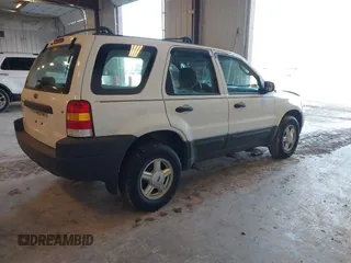 2003 Ford Escape XLS Popular with VIN 1FMYU02123KD48951, listed as a IAAI auction lot 41765772 with 208,796 mi miles. Bid and sale history available at carsss.com. Image 4.