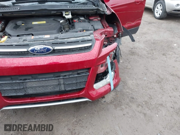 2014 Ford Escape SE with VIN 1FMCU9GX7EUC35483, listed as a IAAI auction lot 41704298 with 105,017 mi miles. Bid and sale history available at carsss.com. Image 13.