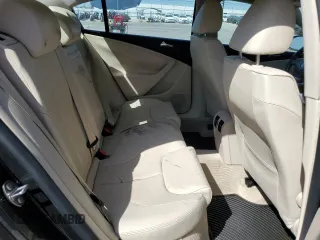 2010 Volkswagen Passat Komfort with VIN WVWJK7ANXAE129739, listed as a Copart auction lot 57798275 with 155,830 mi miles and Salvage title. Bid and sale history available at DreamBid. Image 10.