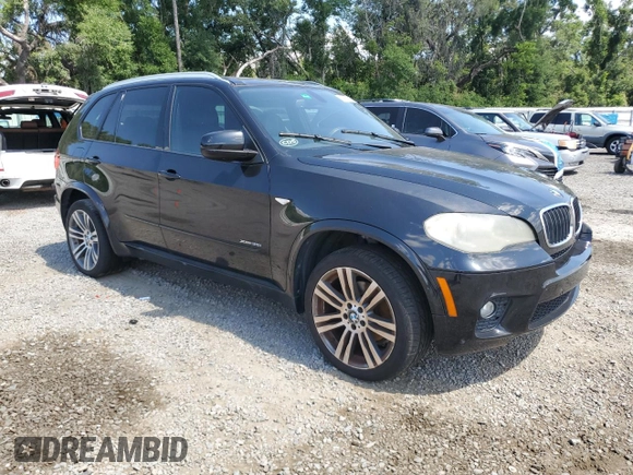 2012 BMW X5 35i with VIN 5UXZV4C54CL744502, listed as a Copart auction lot 57828115 with 161,597 mi miles and Clean title. Bid and sale history available at DreamBid. Image 4.