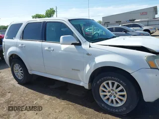 2008 Mercury Mariner Premier z VIN 4M2CU97188KJ53286, wystawiony jako IAAI lot #42269669 z przebiegiem 292 027 mil mil oraz . Historia ofert i sprzedaży dostępna na DreamBid. Obrazek 13.