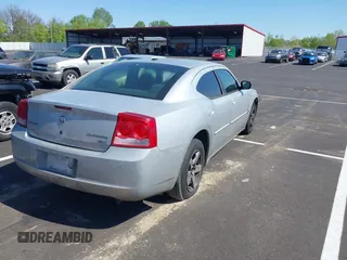 2010 Dodge Charger SXT with VIN 2B3CA3CV4AH253226, listed as a IAAI auction lot 42031664 with 173,785 mi miles. Bid and sale history available at carsss.com. Image 4.