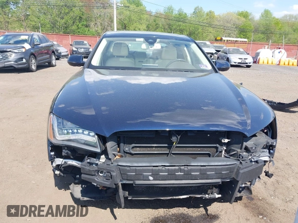 2014 Audi A8 3.0T z VIN WAURGAFD7EN005979, wystawiony jako IAAI lot #42169900 z przebiegiem 126 523 mil mil oraz . Historia ofert i sprzedaży dostępna na DreamBid. Obrazek 12.