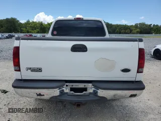 2003 Ford F-250 XL with VIN 1FTNX20L63EB37975, listed as a Copart auction lot 65723935 with 157,377 mi miles and Salvage title. Bid and sale history available at DreamBid. Image 6.