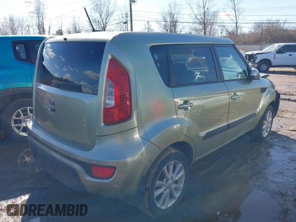 2012 Kia Soul + with VIN KNDJT2A65C7403543, listed as a IAAI auction lot 41633273 with 128,988 mi miles. Bid and sale history available at carsss.com. Image 4.