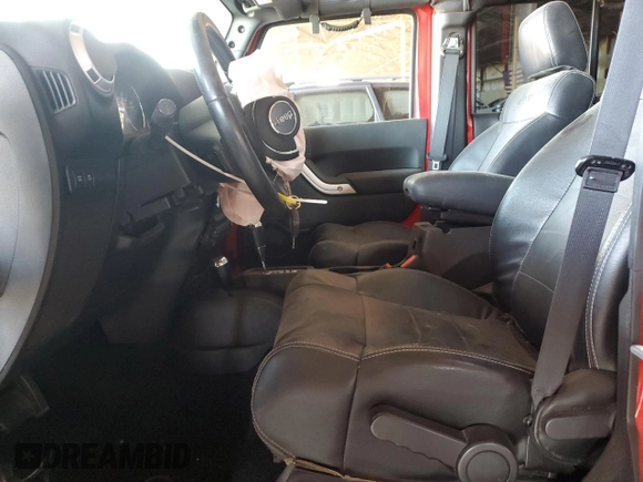 2012 Jeep Wrangler Unlimited Call of Duty MW3 with VIN 1C4BJWFGXCL225459, listed as a Copart auction lot 60699895 with 98,196 mi miles and Salvage title. Bid and sale history available at DreamBid. Image 7.