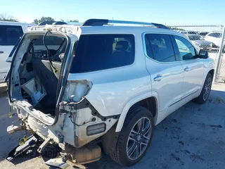 2019 GMC Acadia Denali with VIN 1GKKNPLS0KZ114003, listed as a IAAI auction lot 41246360 with 129,239 mi miles and . Bid and sale history available at carsss.com. Image 4.