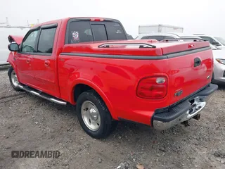 2003 Ford F-150 XLT with VIN 1FTRW07LX3KA76162, listed as a IAAI auction lot 41783926 with 119,009 mi miles. Bid and sale history available at carsss.com. Image 3.