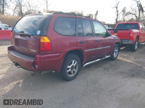 2008 GMC Envoy SLE2 with VIN 1GKDT13S682120370, listed as a IAAI auction lot 41653263 with 214,739 mi miles. Bid and sale history available at carsss.com. Image 4.
