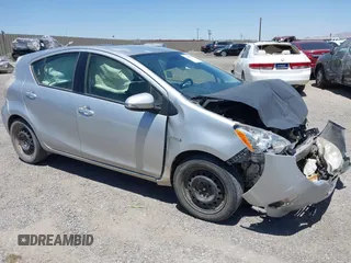 2012 Toyota Prius One z VIN JTDKDTB31C1510295, wystawiony jako IAAI lot #42302769 z przebiegiem 300 208 mil mil oraz . Historia ofert i sprzedaży dostępna na DreamBid. Obrazek 1.