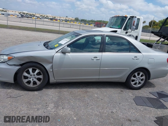 2005 Toyota Camry LE with VIN 4T1BF30KX5U088710, listed as a IAAI auction lot 42113518 with 182,277 mi miles and . Bid and sale history available at DreamBid. Image 14.
