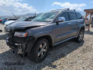 2014 Jeep Grand Cherokee Summit with VIN 1C4RJFJM8EC395169, listed as a Copart auction lot 60637265 with 116,575 mi miles and Salvage title. Bid and sale history available at DreamBid. Image 1.
