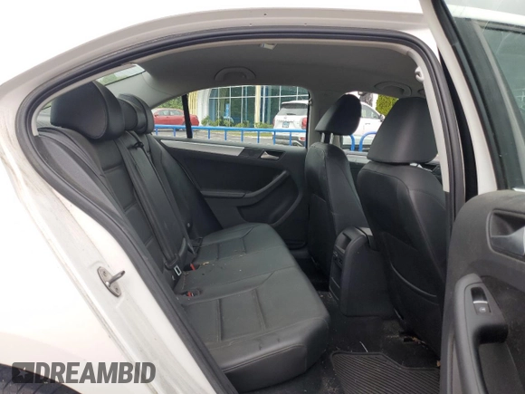 2013 Volkswagen Jetta SE z VIN 3VWDP7AJ0DM219473, wystawiony jako Copart lot #57700105 z przebiegiem 135 832 mil mil oraz Szkoda całkowita • Salvage title. Historia ofert i sprzedaży dostępna na DreamBid. Obrazek 10.