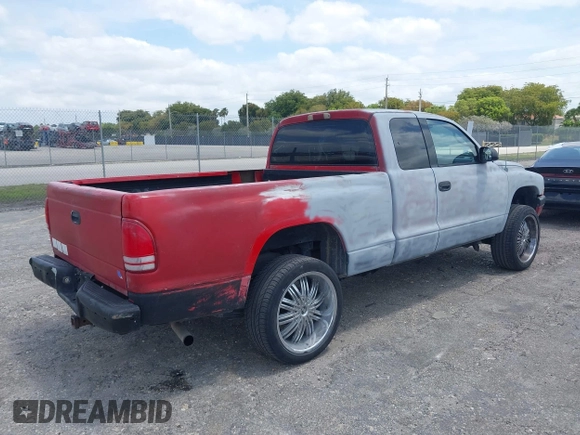 2002 Dodge Dakota Sport with VIN 1B7GL32X82S632091, listed as a IAAI auction lot 42091290 with 206,721 mi miles and . Bid and sale history available at carsss.com. Image 4.