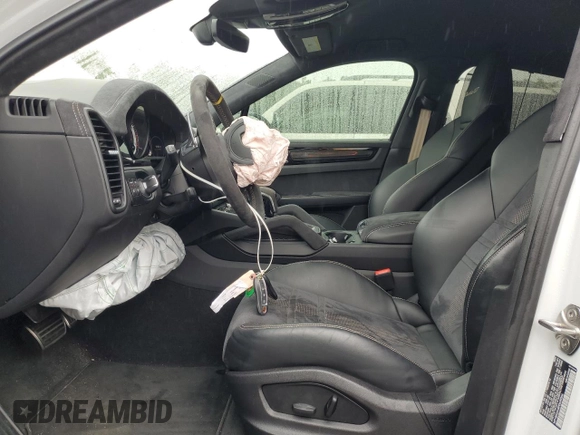 2023 Porsche Cayenne with VIN WP1BK2AY8PDA39066, listed as a Copart auction lot 60699995 with 7,785 mi miles and Salvage title. Bid and sale history available at DreamBid. Image 7.