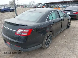 2013 Ford Taurus SHO z VIN 1FAHP2KT6DG174191, wystawiony jako IAAI lot #41752293 z przebiegiem 147 607 mil mil oraz . Historia ofert i sprzedaży dostępna na DreamBid. Obrazek 4.