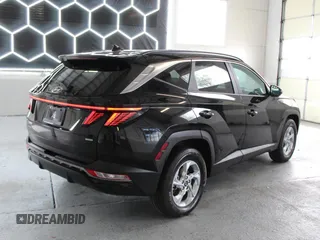 2022 Hyundai Tucson SEL with VIN 5NMJBCAE5NH030189, listed as a Copart auction lot 56405965 with 33,864 mi miles and Salvage Title. Bid and sale history available at DreamBid. Image 3.