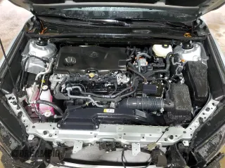 2025 Toyota Camry LE z VIN 4T1DAACKXSU004632, wystawiony jako Copart lot #57882405 z przebiegiem 20 824 mil mil oraz Szkoda całkowita • Salvage title. Historia ofert i sprzedaży dostępna na DreamBid. Obrazek 11.