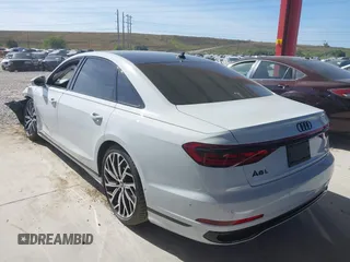 2023 Audi A8 with VIN WAULDAF88PN003324, listed as a IAAI auction lot 41023871 with 4,378 mi miles. Bid and sale history available at carsss.com. Image 3.