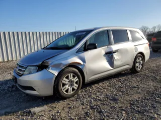 2012 Honda Odyssey LX with VIN 5FNRL5H23CB029435, listed as a Copart auction lot 48216405 with 214,862 mi miles and Salvage Title. Bid and sale history available at carsss.com. Image 1.