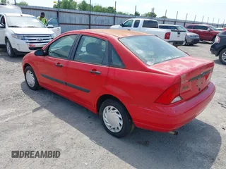 2002 Ford Focus LX with VIN 1FAFP33P32W300699, listed as a IAAI auction lot 42062916 with 108,532 mi miles and . Bid and sale history available at DreamBid. Image 3.
