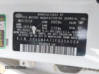 2015 Kia Optima LX with VIN 5XXGM4A71FG356034, listed as a IAAI auction lot 42402142 with 131,376 mi miles and . Bid and sale history available at DreamBid. Image 9.