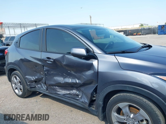 2022 Honda HR-V LX z VIN 3CZRU5H30NM718329, wystawiony jako IAAI lot #42396971 z przebiegiem 28 411 mil mil oraz . Historia ofert i sprzedaży dostępna na DreamBid. Obrazek 13.