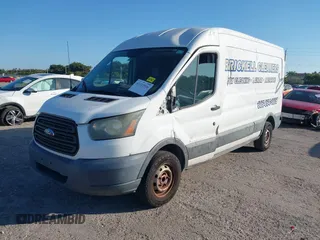 2015 Ford Transit Cargo with VIN 1FTNE2CM9FKA64133, listed as a IAAI auction lot 41312926 with 117,176 mi miles and . Bid and sale history available at carsss.com. Image 17.