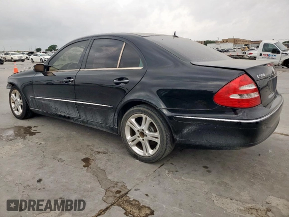 2005 Mercedes-Benz E 5.0L with VIN WDBUF70J85A668355, listed as a Copart auction lot 51750505 with 119,239 mi miles and Salvage Title. Bid and sale history available at carsss.com. Image 2.