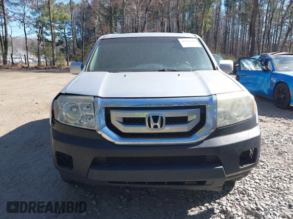 2010 Honda Pilot Touring with VIN 5FNYF4H91AB020868, listed as a IAAI auction lot 41783104 with 298,022 mi miles and . Bid and sale history available at carsss.com. Image 12.