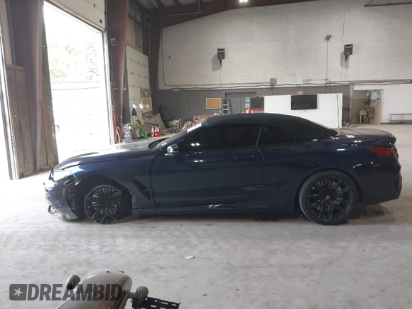 2023 BMW 8 Series with VIN WBAFY4C07PCM50546, listed as a IAAI auction lot 42403241 with 15,697 mi miles and . Bid and sale history available at DreamBid. Image 14.