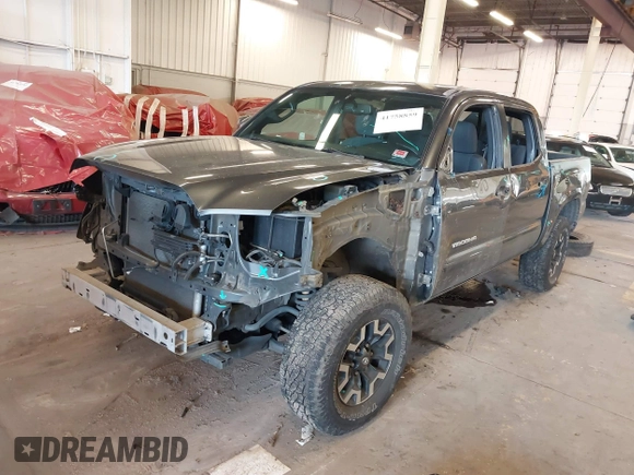 2016 Toyota Tacoma SR with VIN 3TMCZ5AN2GM041649, listed as a IAAI auction lot 41758859 with 139,558 mi miles and . Bid and sale history available at DreamBid. Image 2.