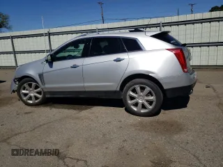 2014 Cadillac SRX Performance Collection z VIN 3GYFNCE38ES559239, wystawiony jako Copart lot #49843955 z przebiegiem 99 497 mil mil oraz Szkoda całkowita • Salvage title. Historia ofert i sprzedaży dostępna na DreamBid. Obrazek 2.