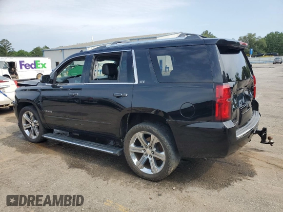 2016 Chevrolet Tahoe LTZ with VIN 1GNSCCKCXGR264655, listed as a Copart auction lot 57456625 with 237,621 mi miles and Salvage title. Bid and sale history available at DreamBid. Image 2.