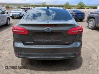 2015 Ford Focus SE with VIN 1FADP3F29FL328828, listed as a Copart auction lot 56420505 with 149,675 mi miles and Salvage title. Bid and sale history available at DreamBid. Image 6.