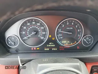 2015 BMW 4 Series 428i z VIN WBA3V5C53FP752002, wystawiony jako Copart lot #53228965 z przebiegiem 98 458 mil mil oraz Szkoda całkowita • Salvage title. Historia ofert i sprzedaży dostępna na DreamBid. Obrazek 9.