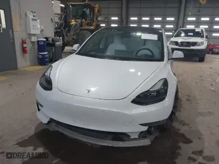2023 Tesla Model 3 Performance with VIN 5YJ3E1EC3PF404882, listed as a IAAI auction lot 41551557 with 36,698 mi miles. Bid and sale history available at carsss.com. Image 6.