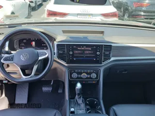 2023 Volkswagen Atlas SE z VIN 1V2HR2CA5PC526012, wystawiony jako IAAI lot #42796408 z przebiegiem 41 216 mil mil oraz . Historia ofert i sprzedaży dostępna na DreamBid. Obrazek 53.
