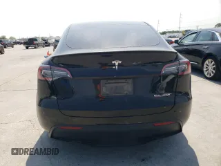 2023 Tesla Model Y Performance with VIN 7SAYGDEF9PF947667, listed as a Copart auction lot 52314795 with 40,634 mi miles and Salvage Title. Bid and sale history available at DreamBid. Image 6.