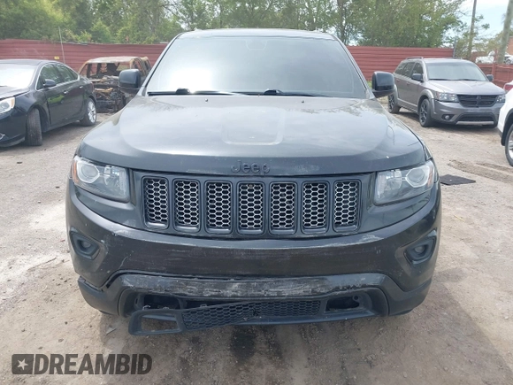 2015 Jeep Grand Cherokee Altitude z VIN 1C4RJFAG5FC682058, wystawiony jako IAAI lot #42352814 z przebiegiem 228 067 mil mil oraz . Historia ofert i sprzedaży dostępna na DreamBid. Obrazek 12.