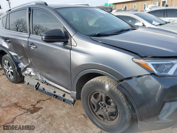 2018 Toyota RAV4 LE with VIN JTMZFREV4JJ183106, listed as a IAAI auction lot 41449468 with 114,719 mi miles. Bid and sale history available at carsss.com. Image 6.