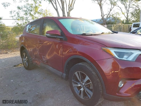 2018 Toyota RAV4 XLE with VIN 2T3WFREV7JW496591, listed as a IAAI auction lot 41752233 with 54,027 mi miles. Bid and sale history available at carsss.com. Image 6.