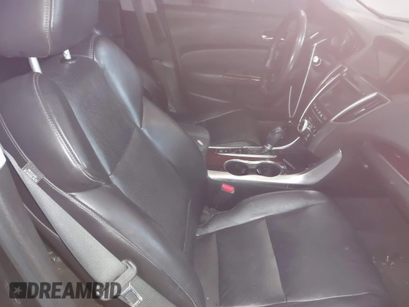2015 Acura TLX Tech with VIN 19UUB1F5XFA003321, listed as a IAAI auction lot 41703980 with 102,227 mi miles. Bid and sale history available at carsss.com. Image 5.