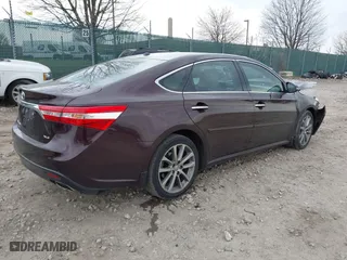 2014 Toyota Avalon Limited with VIN 4T1BK1EB8EU109398, listed as a IAAI auction lot 41843832 with 138,405 mi miles. Bid and sale history available at carsss.com. Image 4.