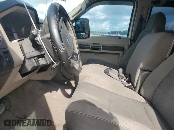 2009 Ford F-250 XL with VIN 1FTSW21R19EB22852, listed as a Copart auction lot 60052435 with 147,095 mi miles and Salvage title. Bid and sale history available at DreamBid. Image 7.